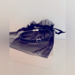 Endless Jewelry double leather bracelet with a silver heart charm.